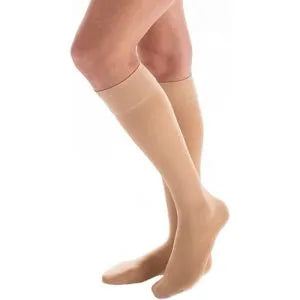 Carolon compression stockings on a model in beige