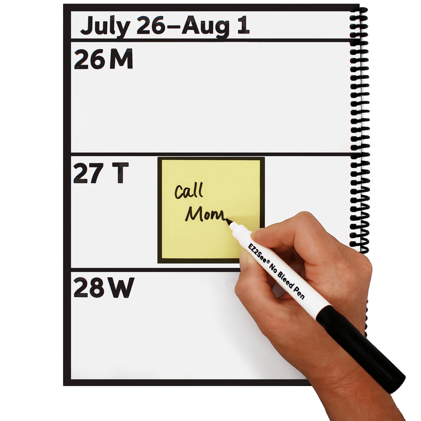 Prevent Products EZ2See large print academic planner open to July 26-Aug 1, showing a hand writing on a yellow sticky note.