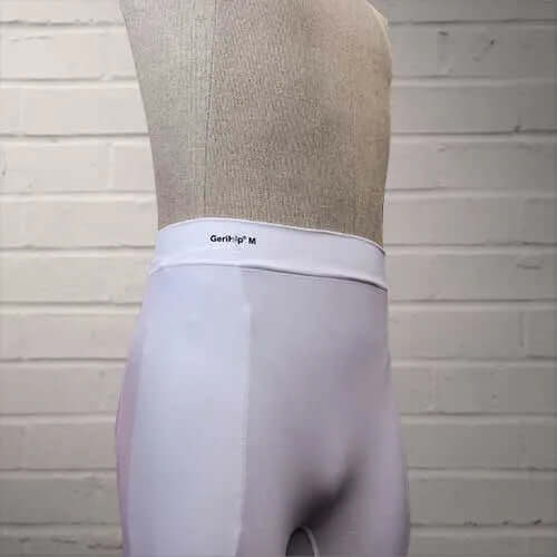 GeriHip Hip Protector Briefs in White displayed on a mannequin