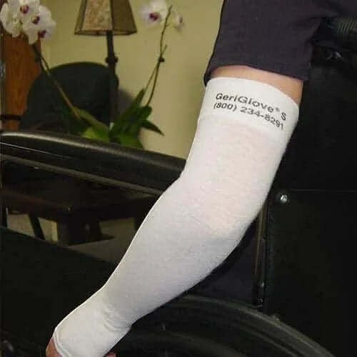 Prevent Products GeriGlove thin skin arm protector in white, made of cotton, nylon, and spandex. Seamless knit design for comfort and protection.